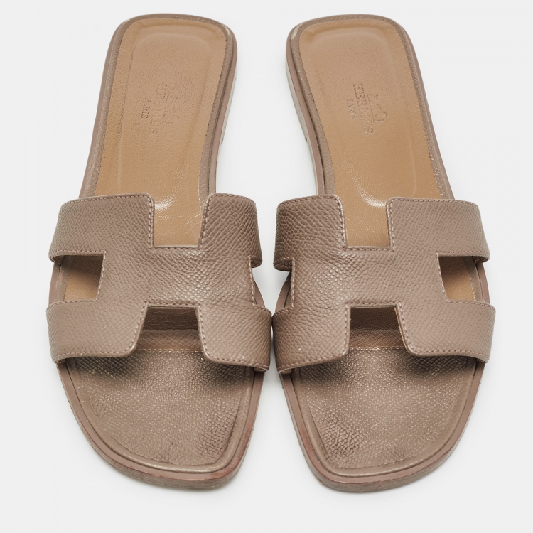Pre Owned Hermes Brown Lizard Embossed Leather Oran Flat Slides Size 37.5  