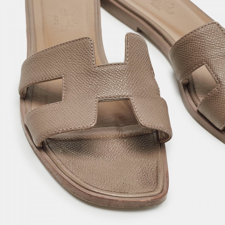 Pre Owned Hermes Brown Lizard Embossed Leather Oran Flat Slides Size 37.5  