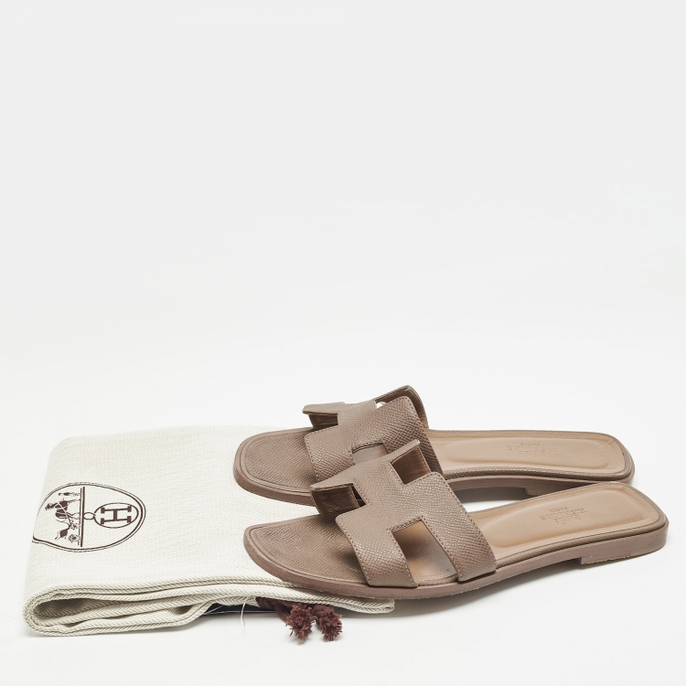 Pre Owned Hermes Brown Lizard Embossed Leather Oran Flat Slides Size 37.5  