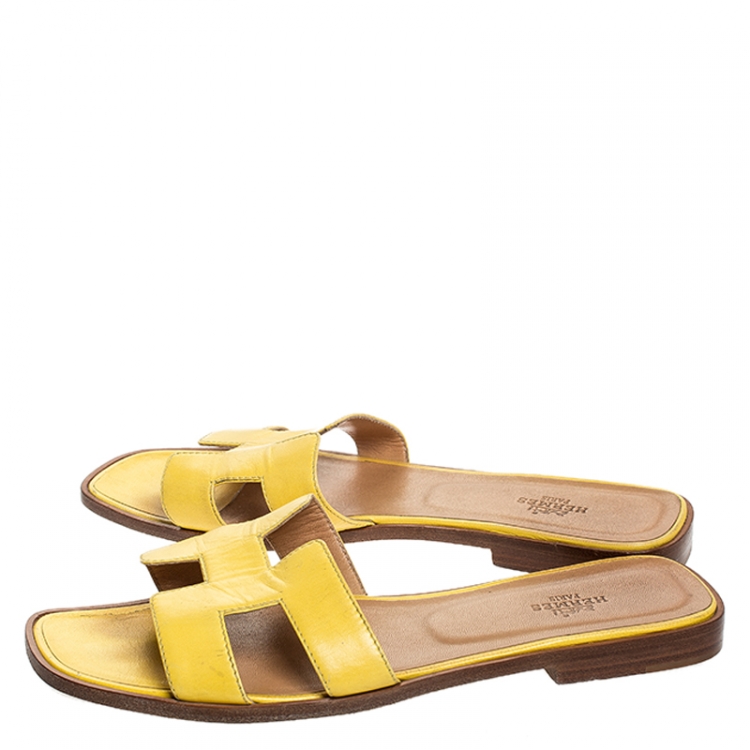 Pre Owned Hermes Yellow Leather Oran Slip On Slides Size 39