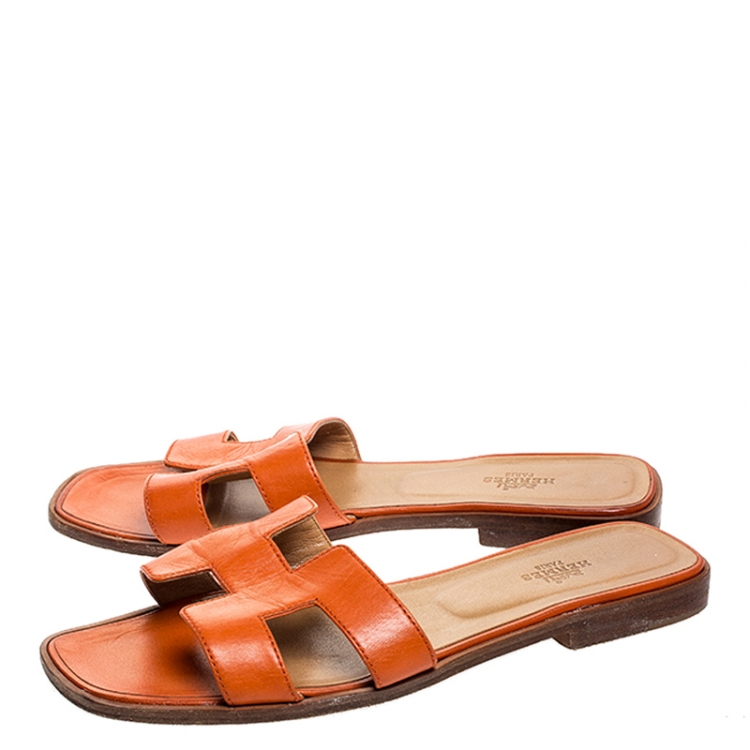 Pre Owned Hermes Orange Leather Oran Flat Slides Size 39