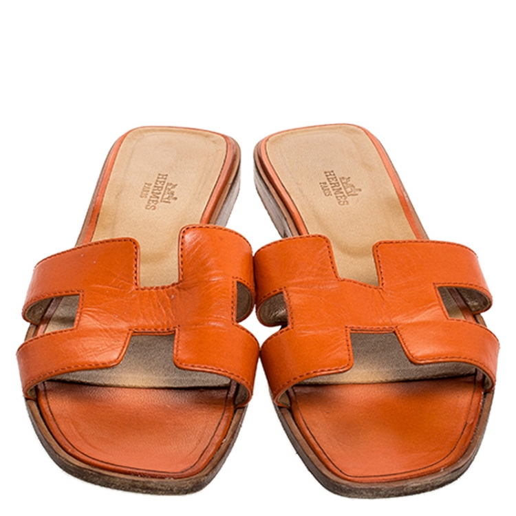 Pre Owned Hermes Orange Leather Oran Flat Slides Size 39