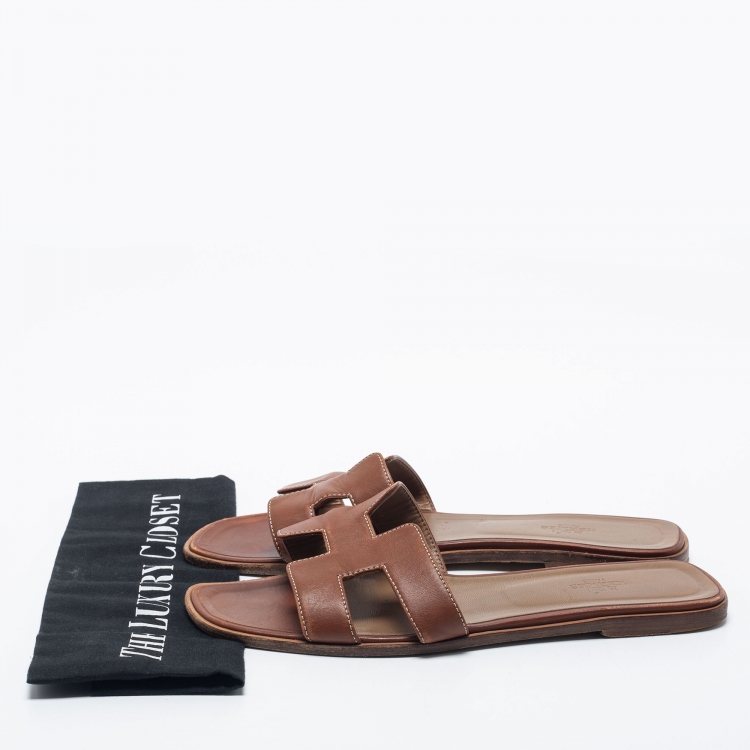 Pre Owned Hermes Brown Leather Oran Flat Slides Size 41.5