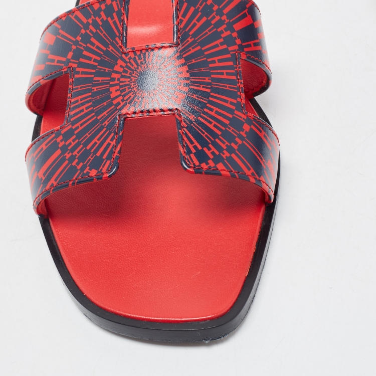 Pre Owned Hermes Red/Blue Print Leather Oran Flat Slides Size 39