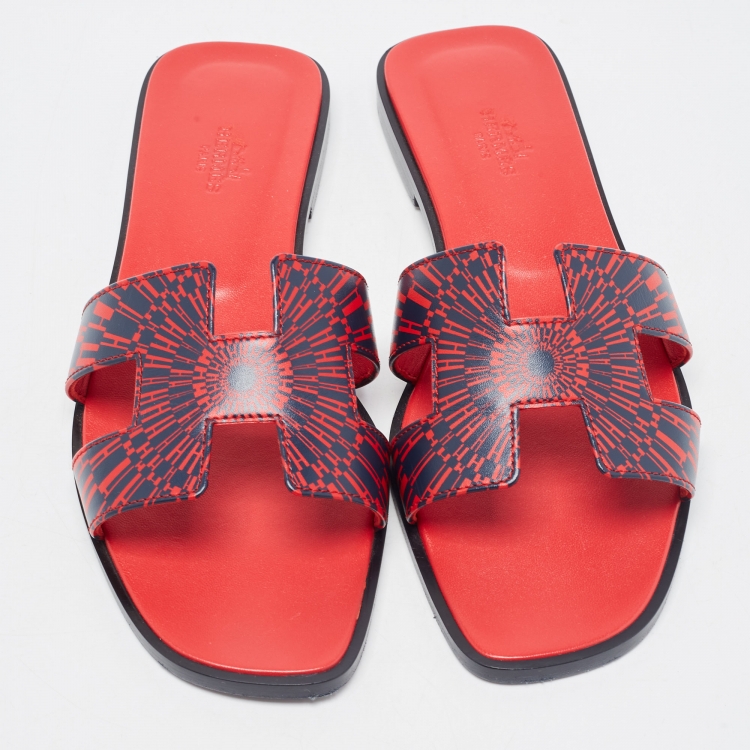 Pre Owned Hermes Red/Blue Print Leather Oran Flat Slides Size 39