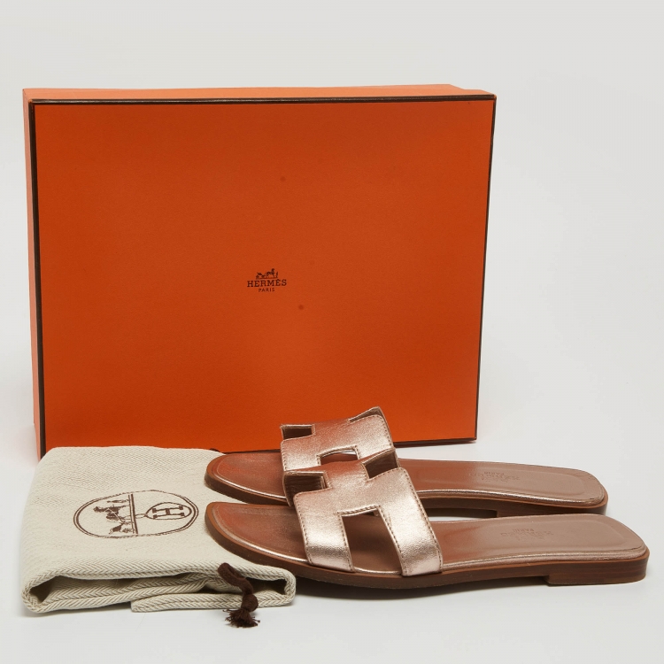 Pre Owned Hermes Metallic Rose Gold Leather Oran Flat Slides Size 36.5