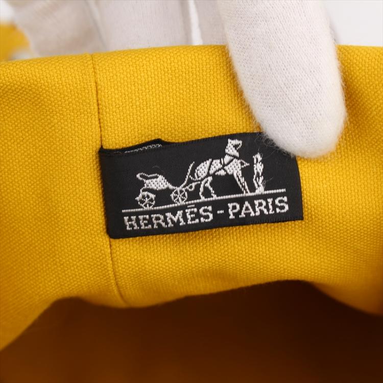 Pre Owned Hermes Yellow Canvas Sac Polochon Drawstring Backpack
