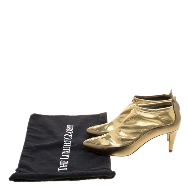 Pre Owned Jimmy Choo Metallic Gold Leather and PVC Dierdre Ankle Boots Size 37