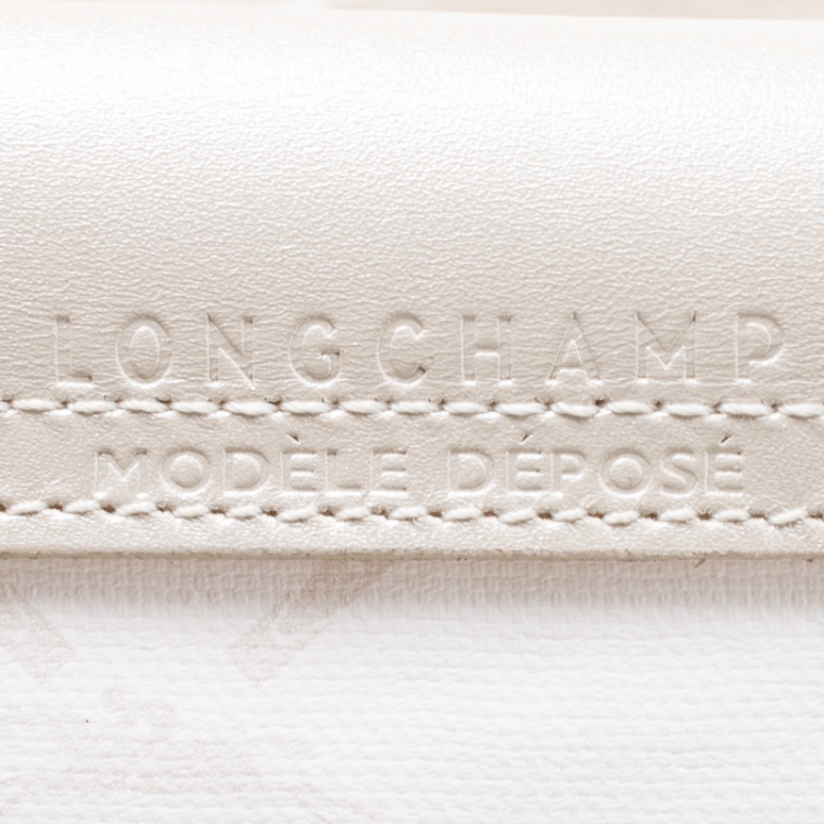 Pre Owned Longchamp White/Light Gold Logo Printed Coated Canvas Le Pliage Tote