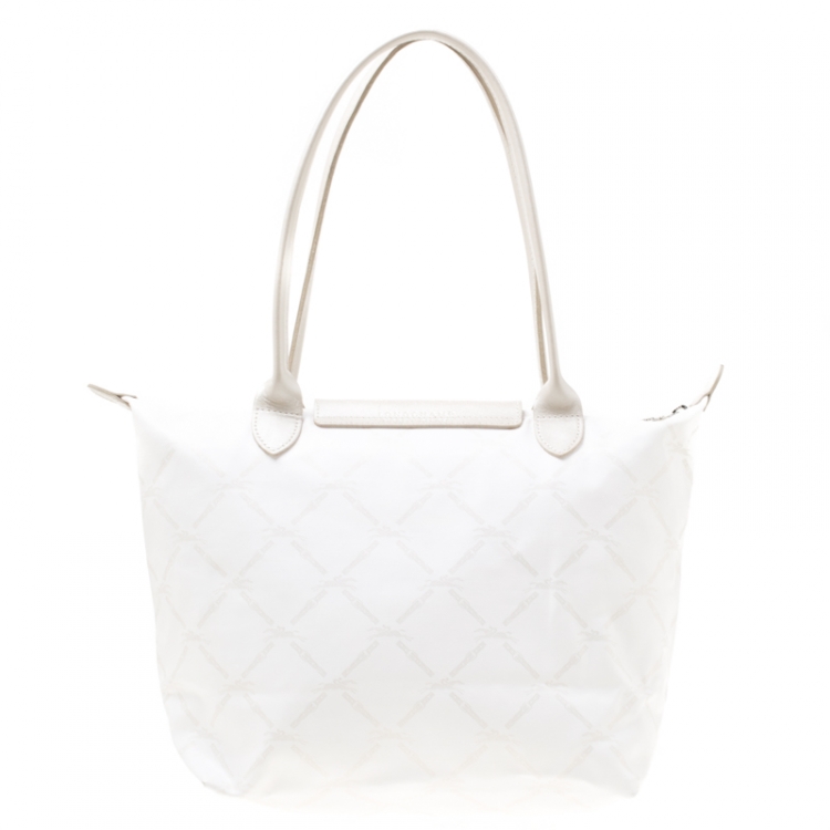 Pre Owned Longchamp White/Light Gold Logo Printed Coated Canvas Le Pliage Tote