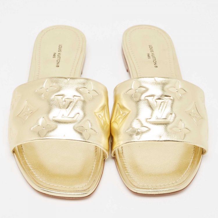 Pre Owned Louis Vuitton Gold Monogram Embossed Leather Revival Flat Slides Size 38