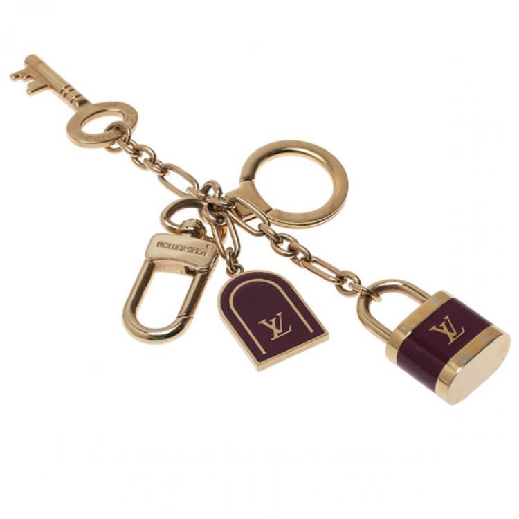 LOUIS VUITTON Cadenas Key Holder Gold Metal