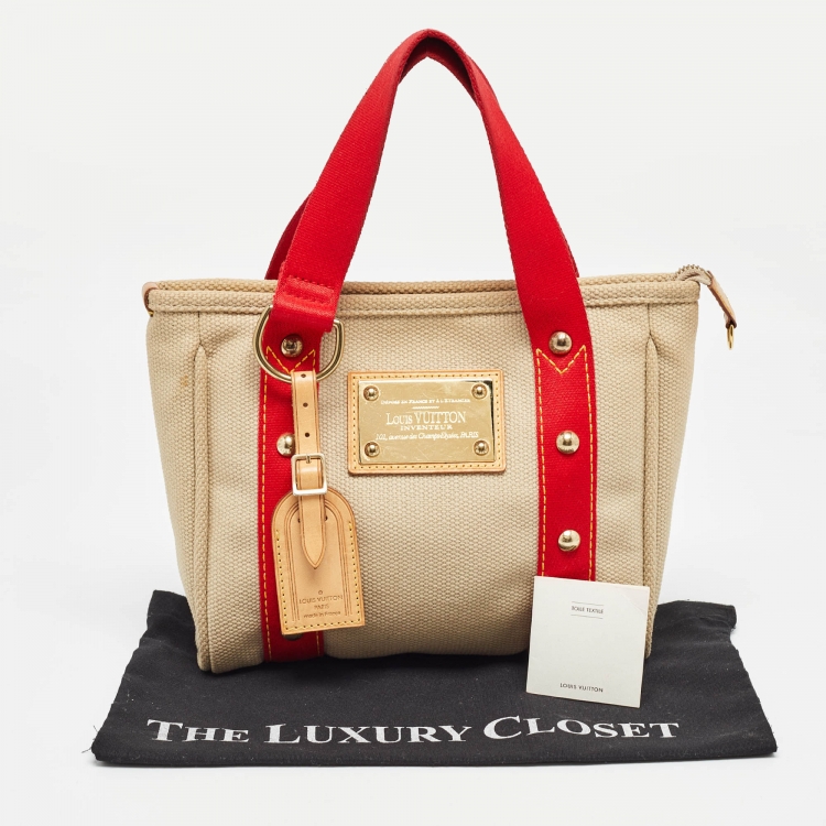 مملوكة مسبقًا Louis Vuitton Beige/Red Canvas Antigua Cabas PM Bag