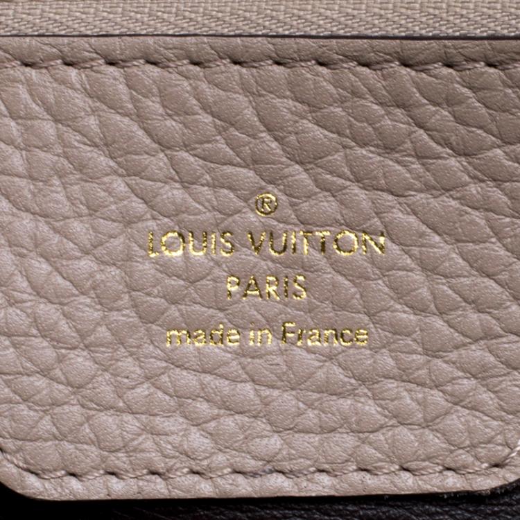Pre Owned Louis Vuitton Beige Taurillon Leather Capucines GM Bag