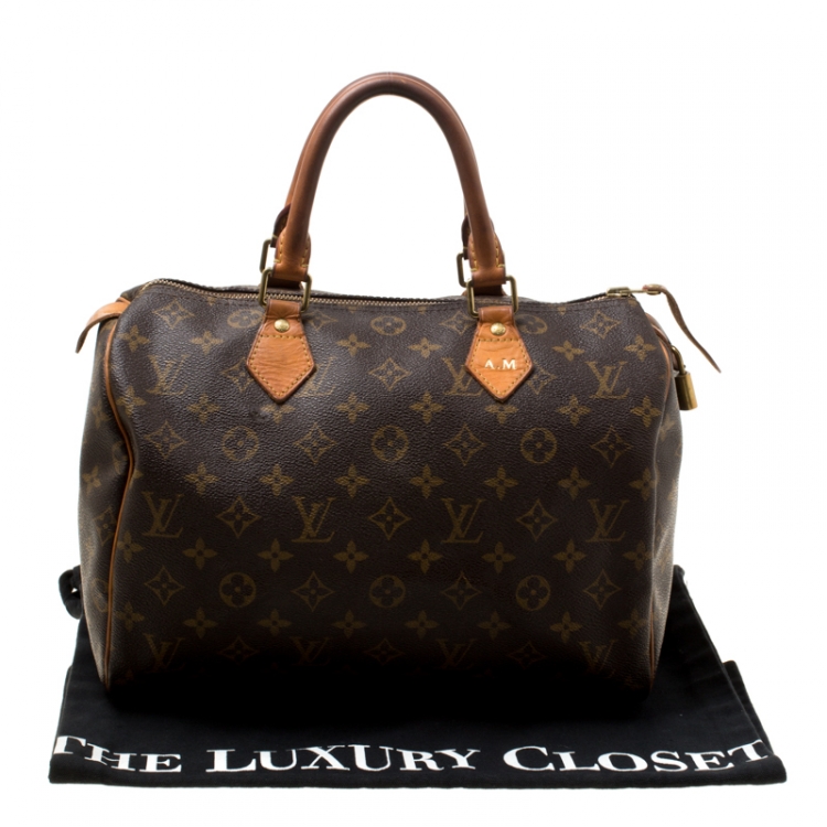 مملوكة مسبقًا Louis Vuitton Monogram Canvas and Leather Speedy 30 Bag