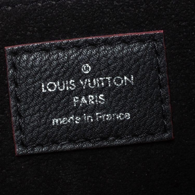 مملوكة مسبقًا Louis Vuitton Black Leather Mylockme Studs Bag