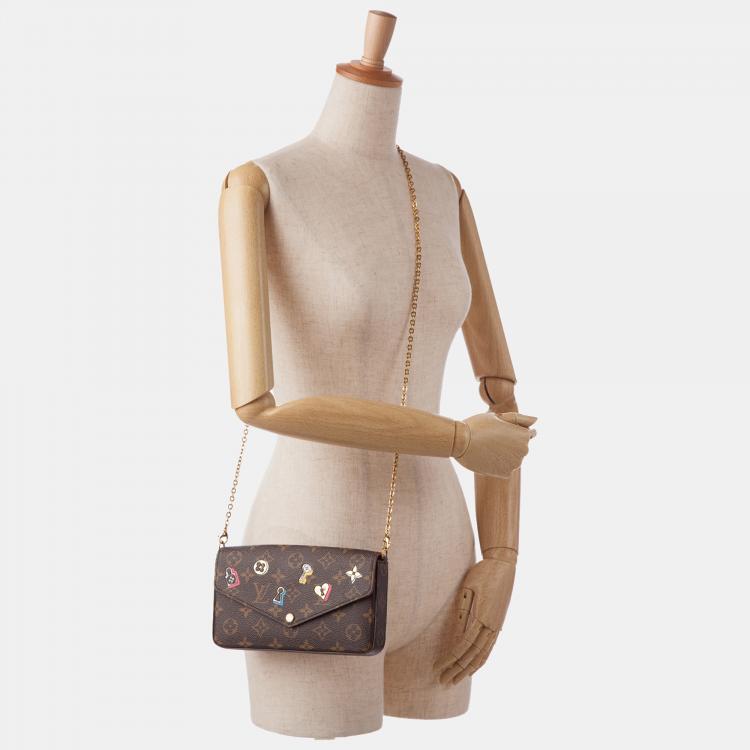 Pre Owned Louis Vuitton Monogram Love Lock Pochette Felicie