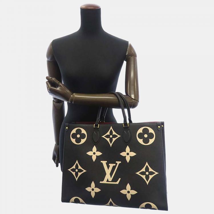 Louis Vuitton Black Giant Monogram Empreinte Onthego GM Gold