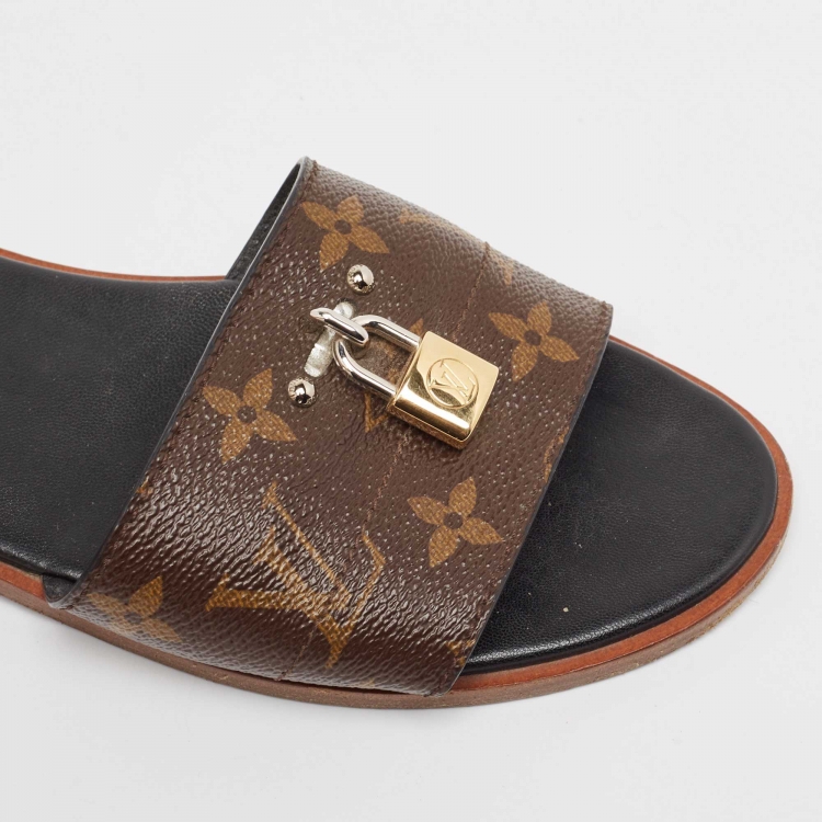 Pre Owned Louis Vuitton Brown Monogram Coated Canvas Lock It Flat Slides Size 38