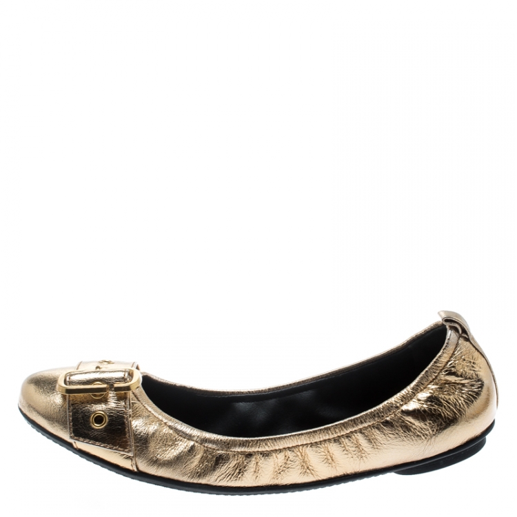 gold dolly shoes