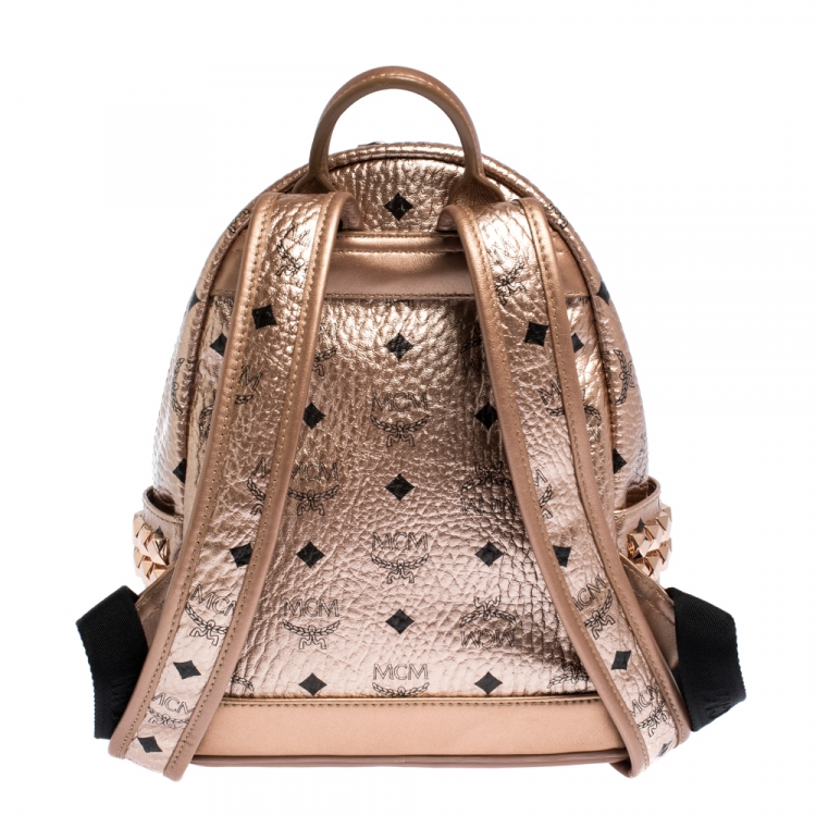 Pre Owned MCM Metallic Peach Visetos Coated Canvas and Leather Studs Stark Backpack