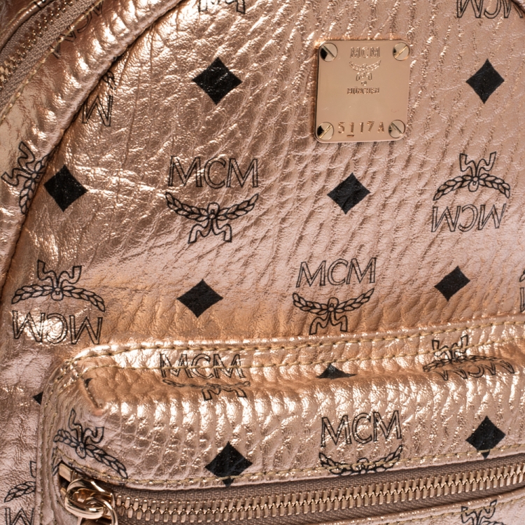 Pre Owned MCM Metallic Peach Visetos Coated Canvas and Leather Studs Stark Backpack