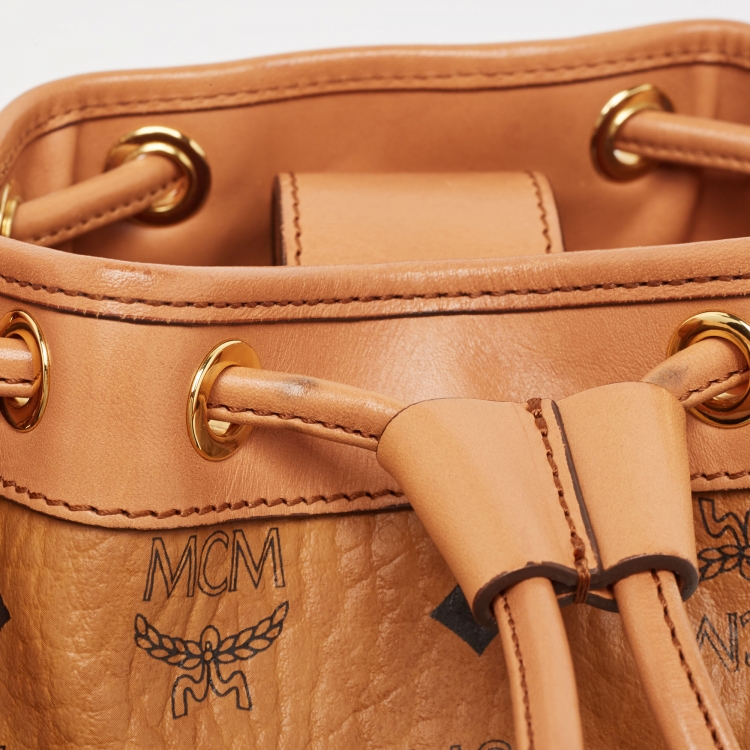 Pre Owned MCM Cognac Visetos Coated Canvas and Leather Mini Drawstring Bucket Bag