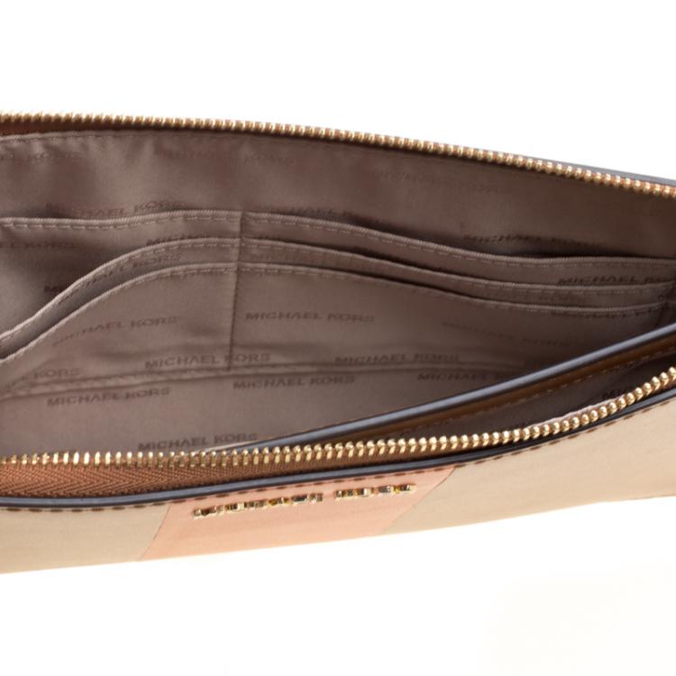 Pre Owned Michael Kors Tan/Orange Leather Large Center Stripe Daniela Wristlet