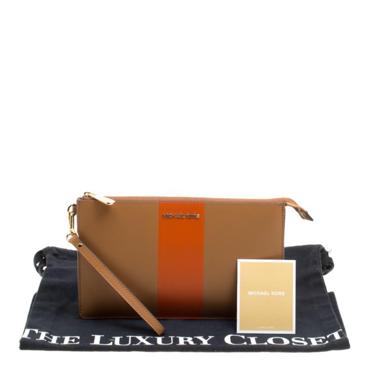 Pre Owned Michael Kors Tan/Orange Leather Large Center Stripe Daniela Wristlet