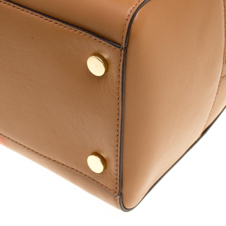 Pre Owned Michael Kors Tan/Orange Leather Medium Center Stripe Mercer Duffle Bag