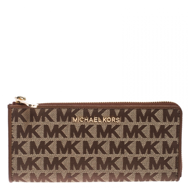 Pre Owned Michael Kors Beige Signature Canvas and Leather Zip Around Wallet