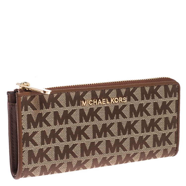 Pre Owned Michael Kors Beige Signature Canvas and Leather Zip Around Wallet