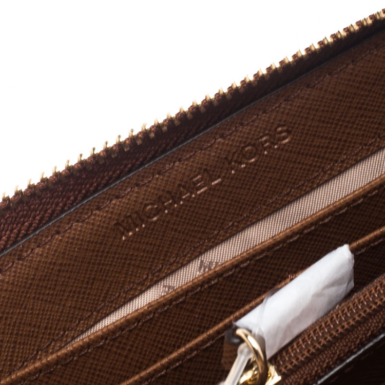 Pre Owned Michael Kors Beige Signature Canvas and Leather Zip Around Wallet