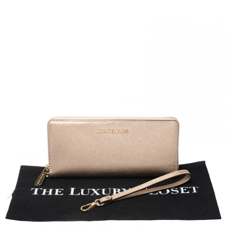 Pre Owned Michael Kors Metallic Gold Leather Jet Set Travel Continental Wallet