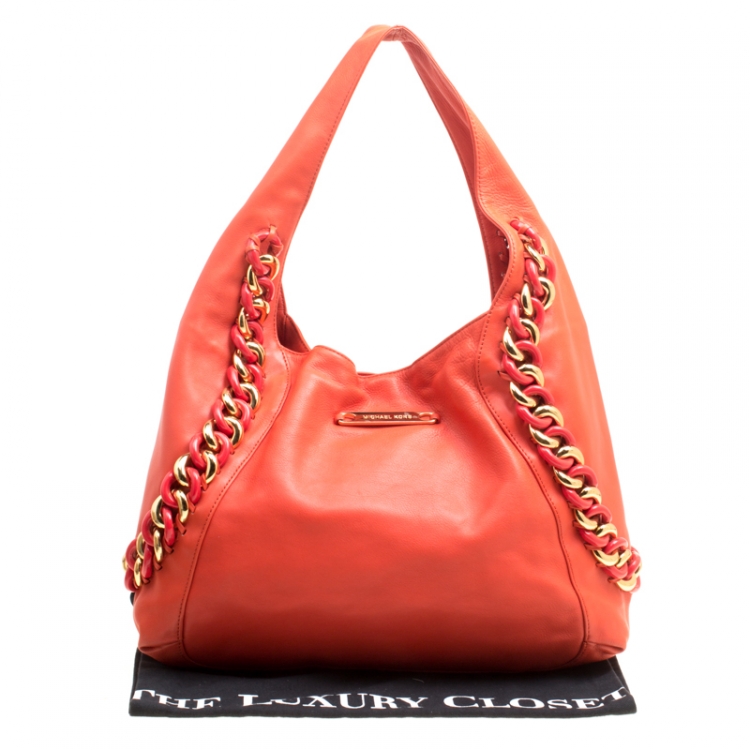 Pre Owned Michael Kors Orange Leather ID Chain Hobo