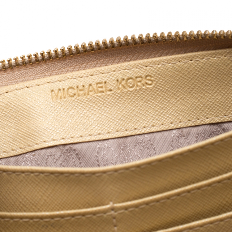 Pre Owned Michael Kors Gold Patent Leather Jet Set Zip Around Wallet