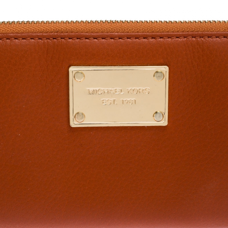 Pre Owned Michael Kors Orange Leather Zipped Around Wallet 