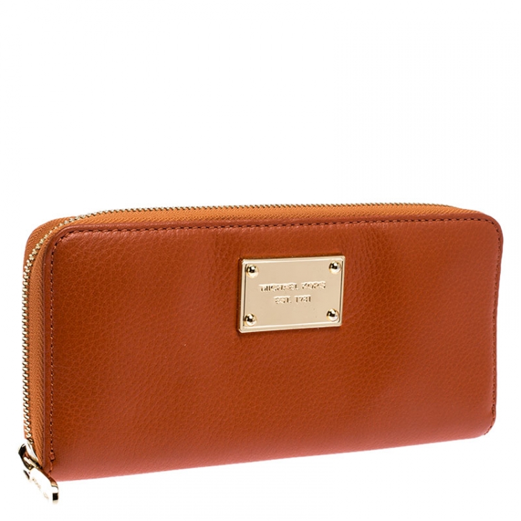 Pre Owned Michael Kors Orange Leather Zipped Around Wallet 