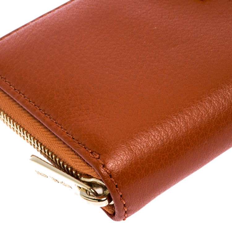 Pre Owned Michael Kors Orange Leather Zipped Around Wallet 