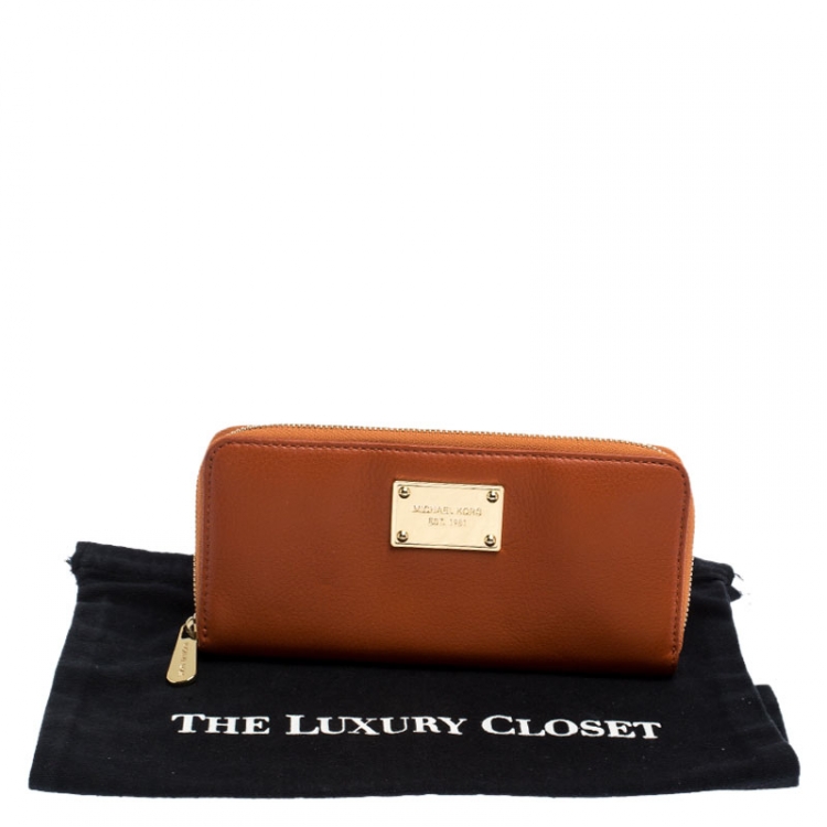 Pre Owned Michael Kors Orange Leather Zipped Around Wallet 