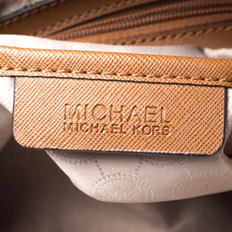 Pre Owned Michael Kors Off White Signature Coated Canvas Jet Set Snap Pocket Tote