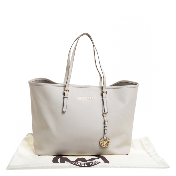 Pre Owned Michael Kors Cream Leather Jet Set Travel Tote