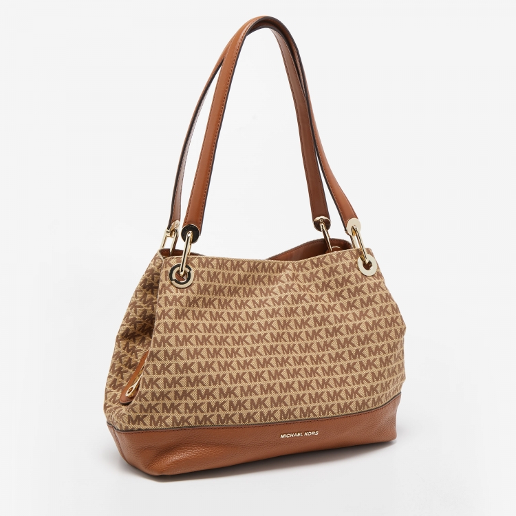 Pre Owned Michael Kors Brown/Beige Signature Canvas and Leather Raven Tote 