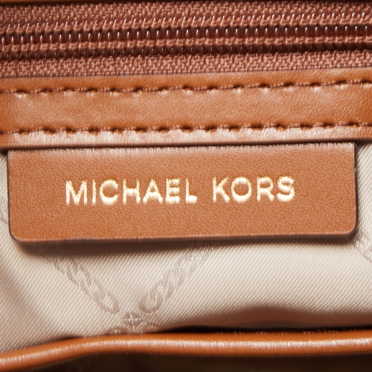 Pre Owned Michael Kors Brown/Beige Signature Canvas and Leather Raven Tote 