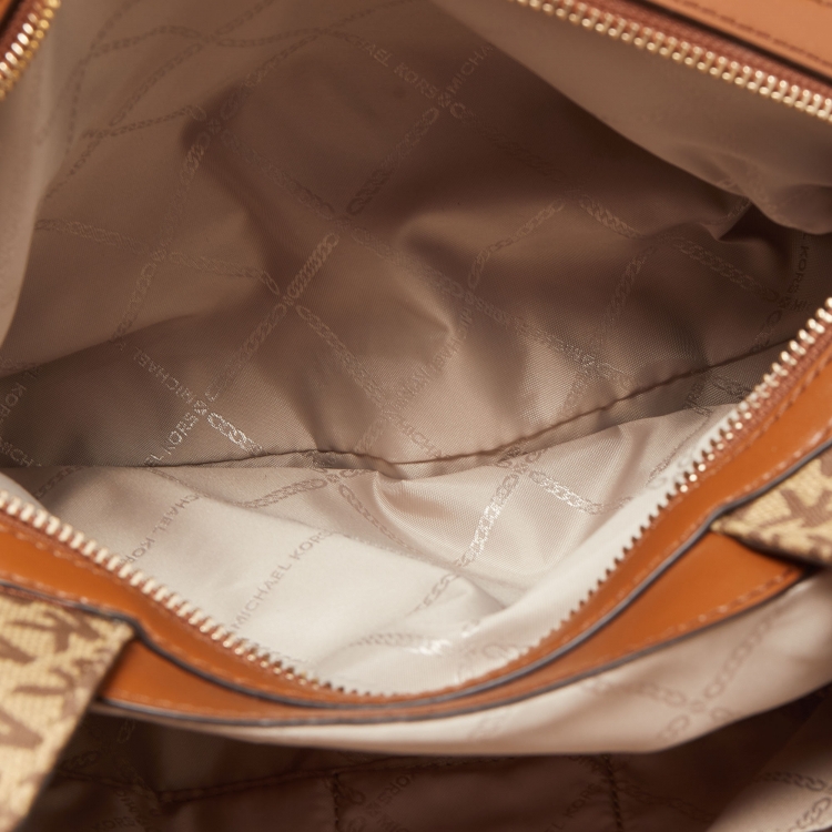 Pre Owned Michael Kors Brown/Beige Signature Canvas and Leather Raven Tote 