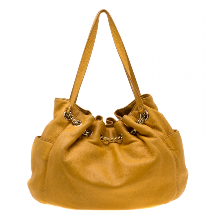 Pre Owned Michael Michael Kors Yellow Leather Drawstring Shoulder Bag