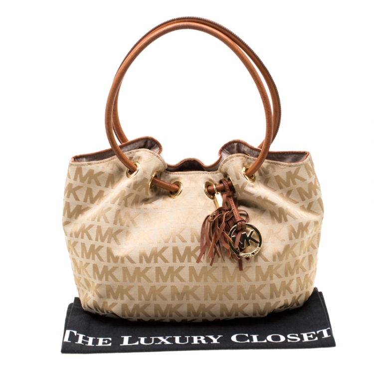 Pre Owned MICHAEL Michael Kors Beige/Brown Signature Canvas and Leather Ring Tassel Tote