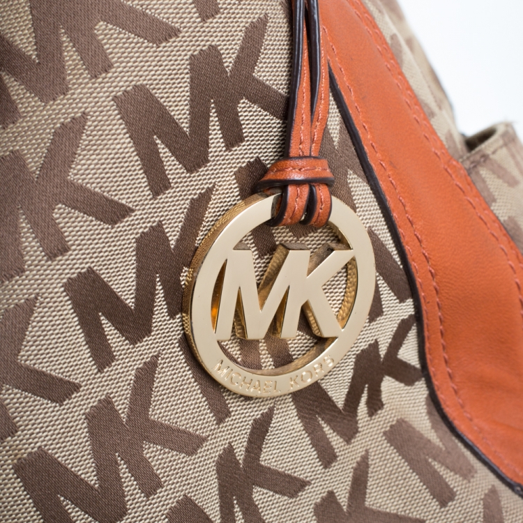 Pre Owned MICHAEL Michael Kors Beige/Orange Canvas and Leather Sided Pocket Bag