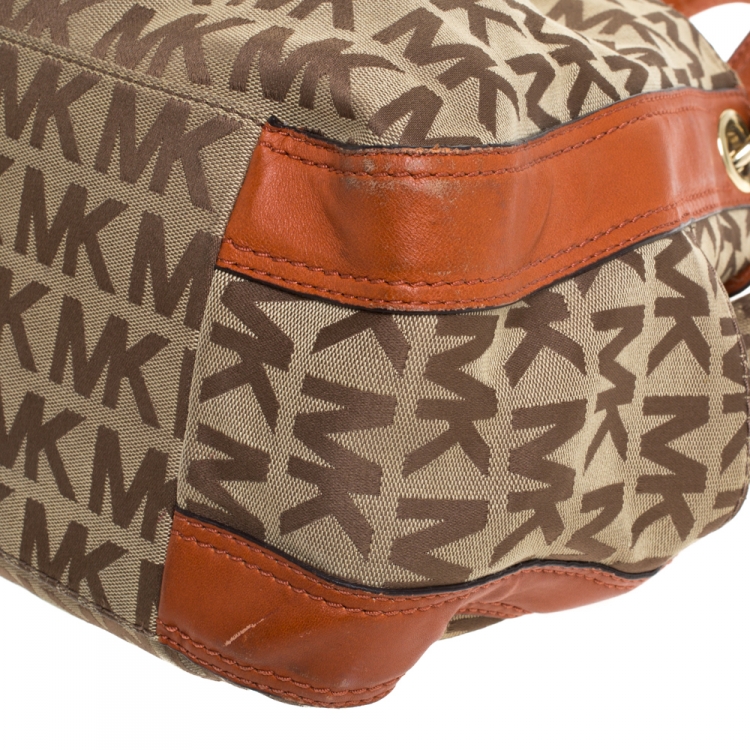 Pre Owned MICHAEL Michael Kors Beige/Orange Canvas and Leather Sided Pocket Bag