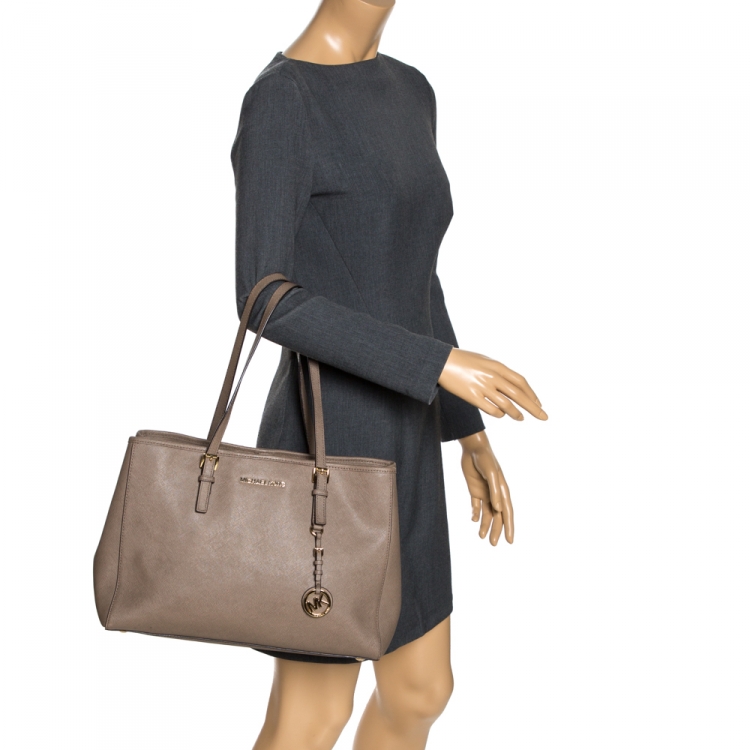 Pre Owned MICHAEL Michael Kors Beige Leather Medium Jet Set Travel Tote